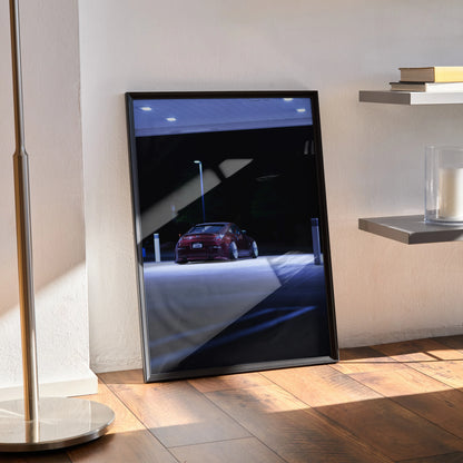 Nissan 350Z poster with red car under streetlights, modern high-resolution wall art in black frame.