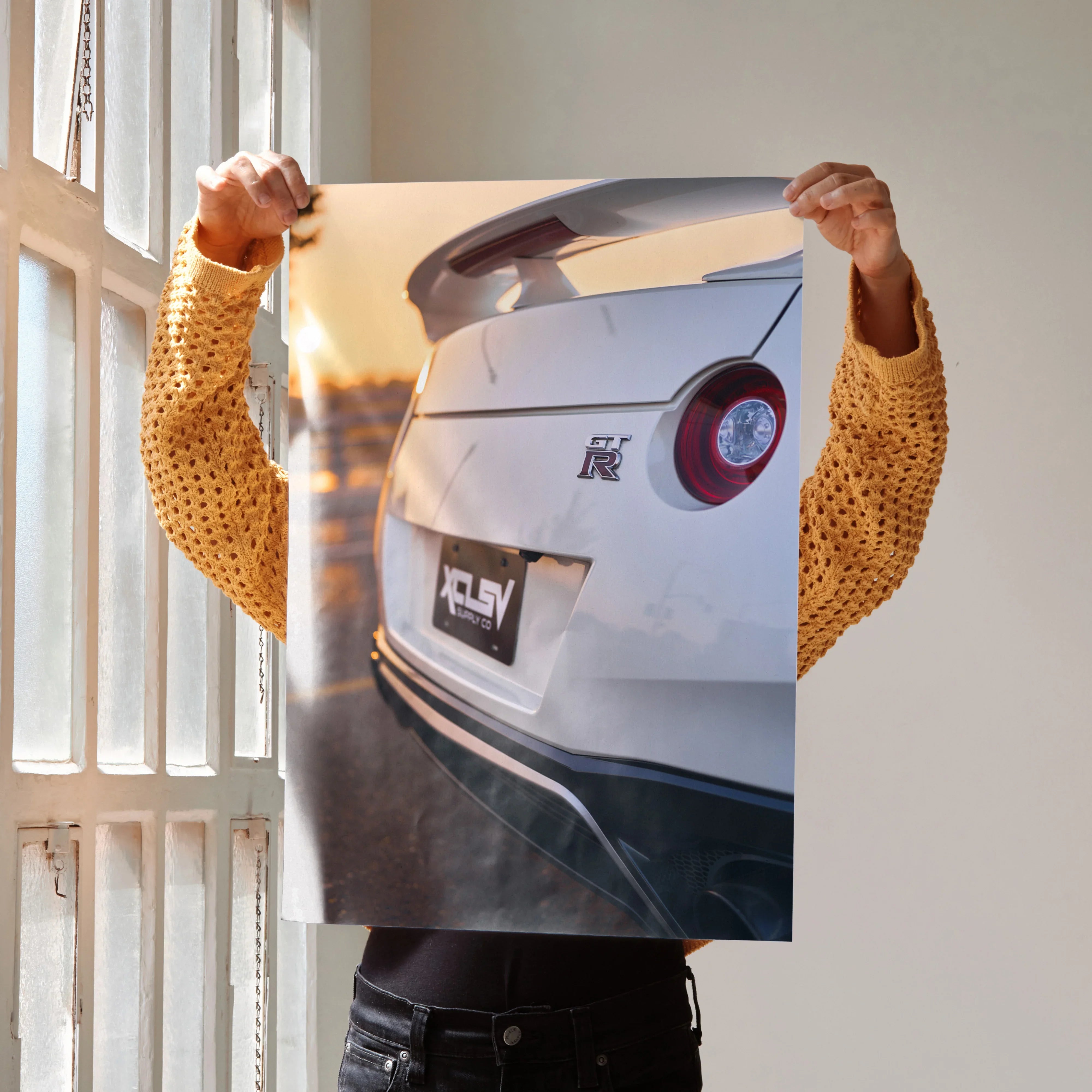 Nissan GTR R35 rear close-up poster with sunset lighting, high-resolution wall art.