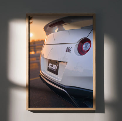 Nissan GTR R35 rear close-up with sunset glow Poster wall art in wooden frame.