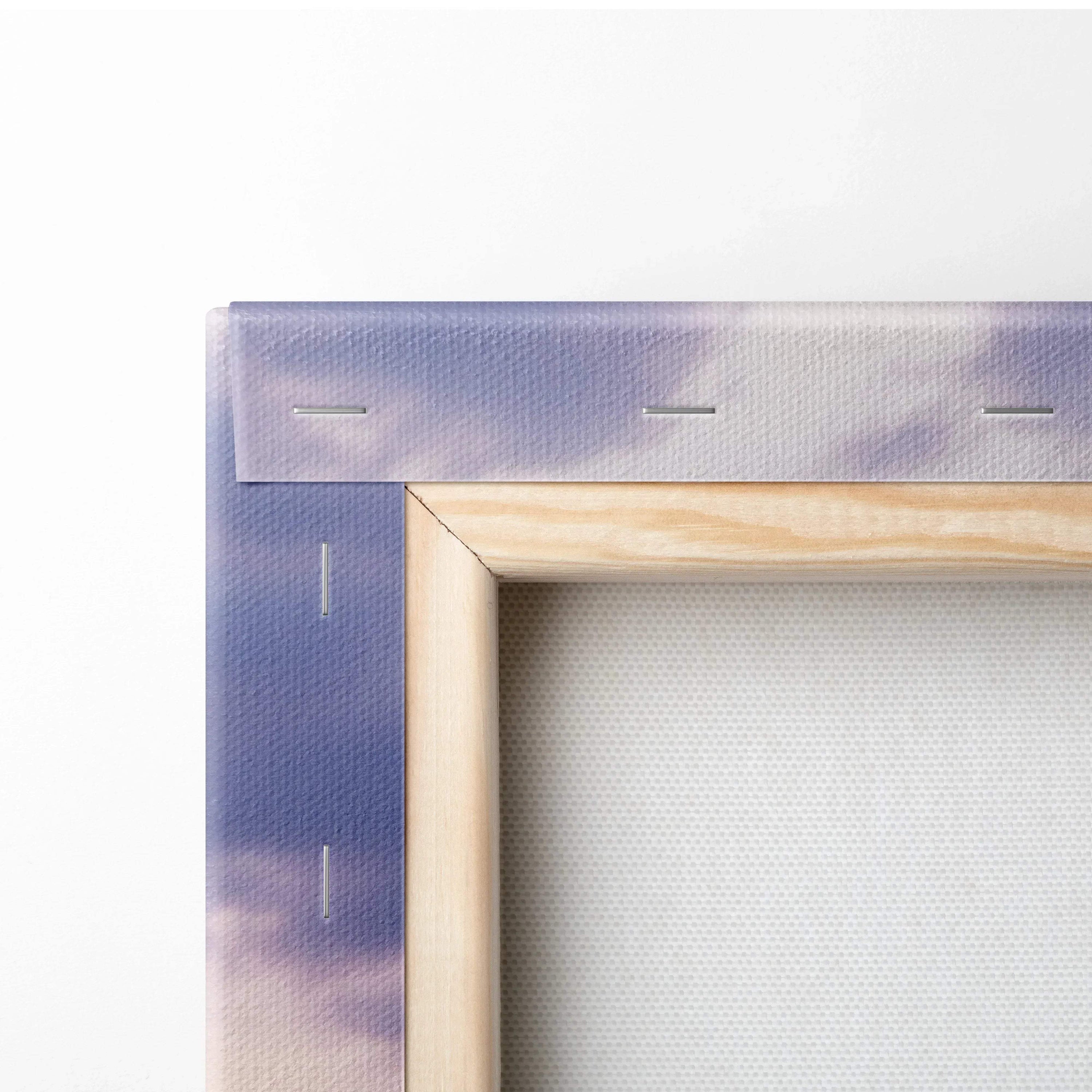 Close-up of wooden frame and purple canvas edge with stapled mounting for wall art canvas print.