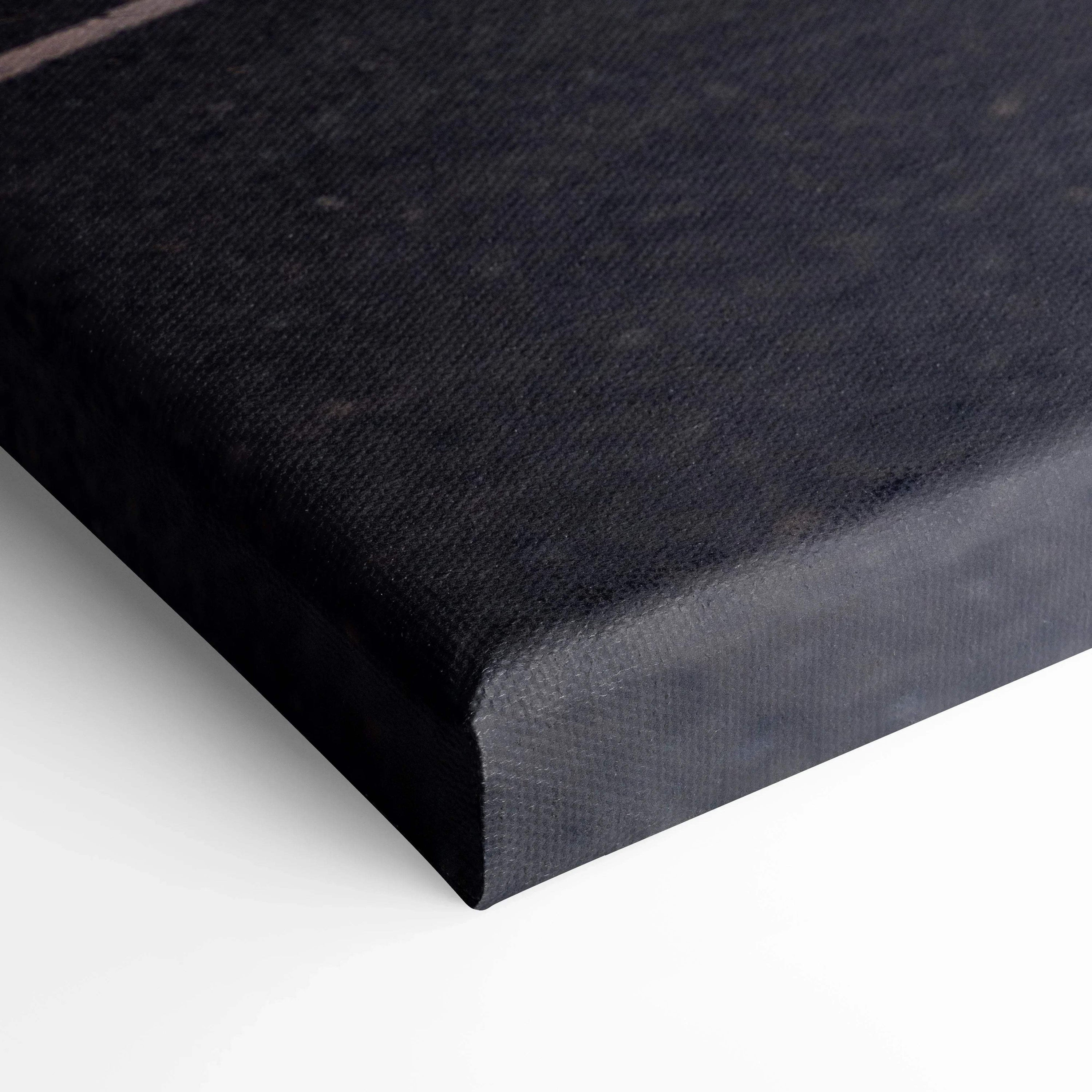 Close-up of black textured canvas corner for high-resolution wall art print.