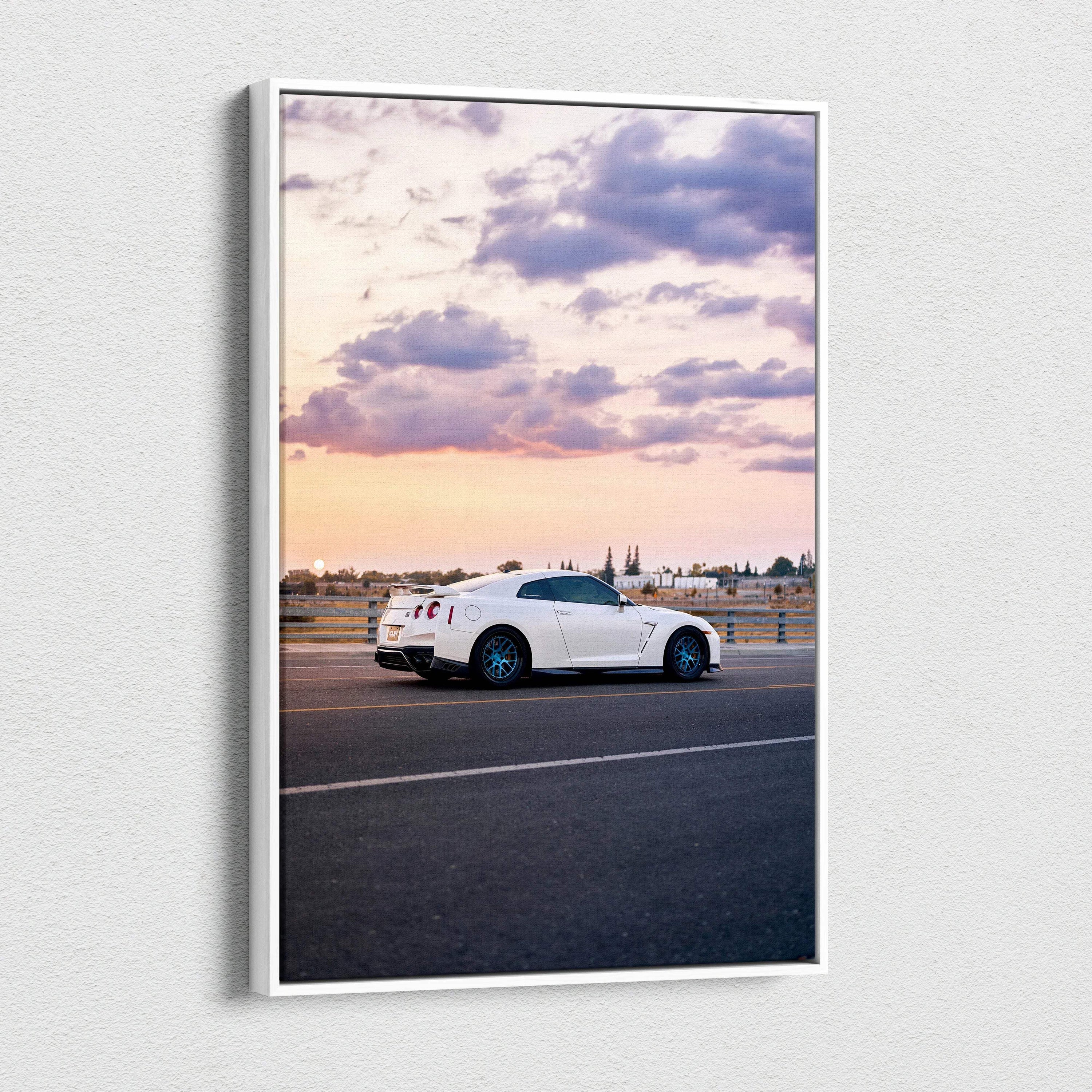 Nissan R35 GTR at sunset on vertical canvas wall art with cityscape background.