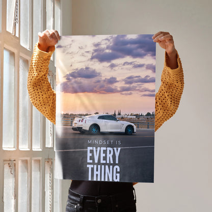Motivational poster wall art featuring white Nissan R35 GT-R with sunset and inspiring text Mindset Is Everything.