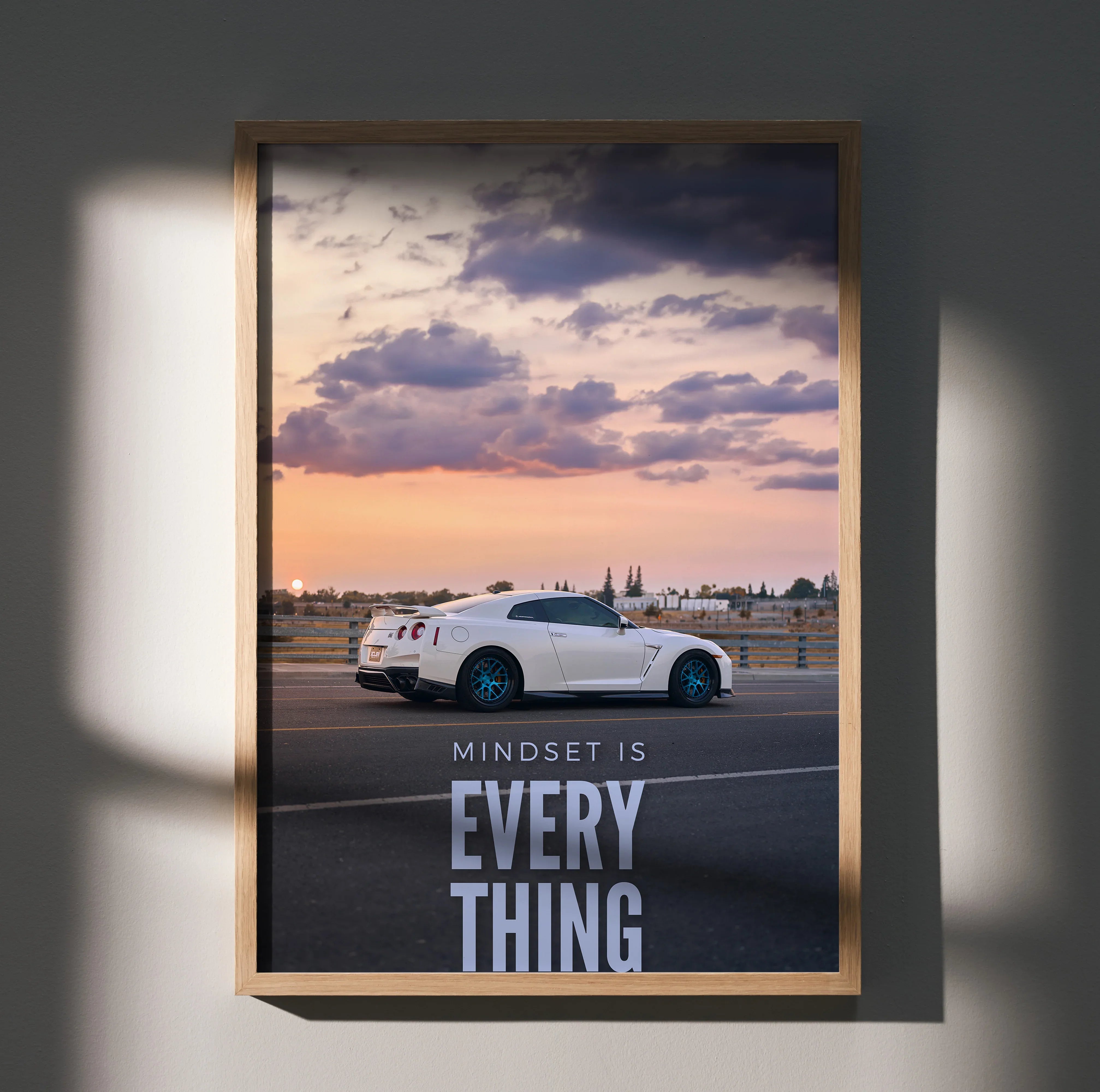 Nissan R35 GT-R poster with sunset background and motivational text wall art.