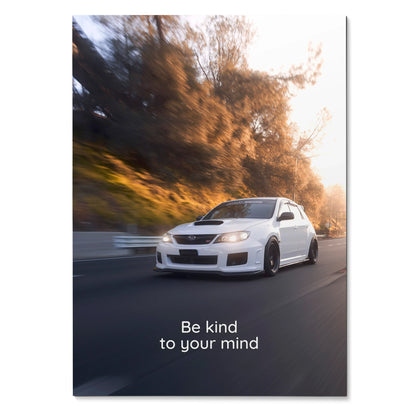 Subaru WRX STI driving on road with "Be kind to your mind" motivational text poster wall art.