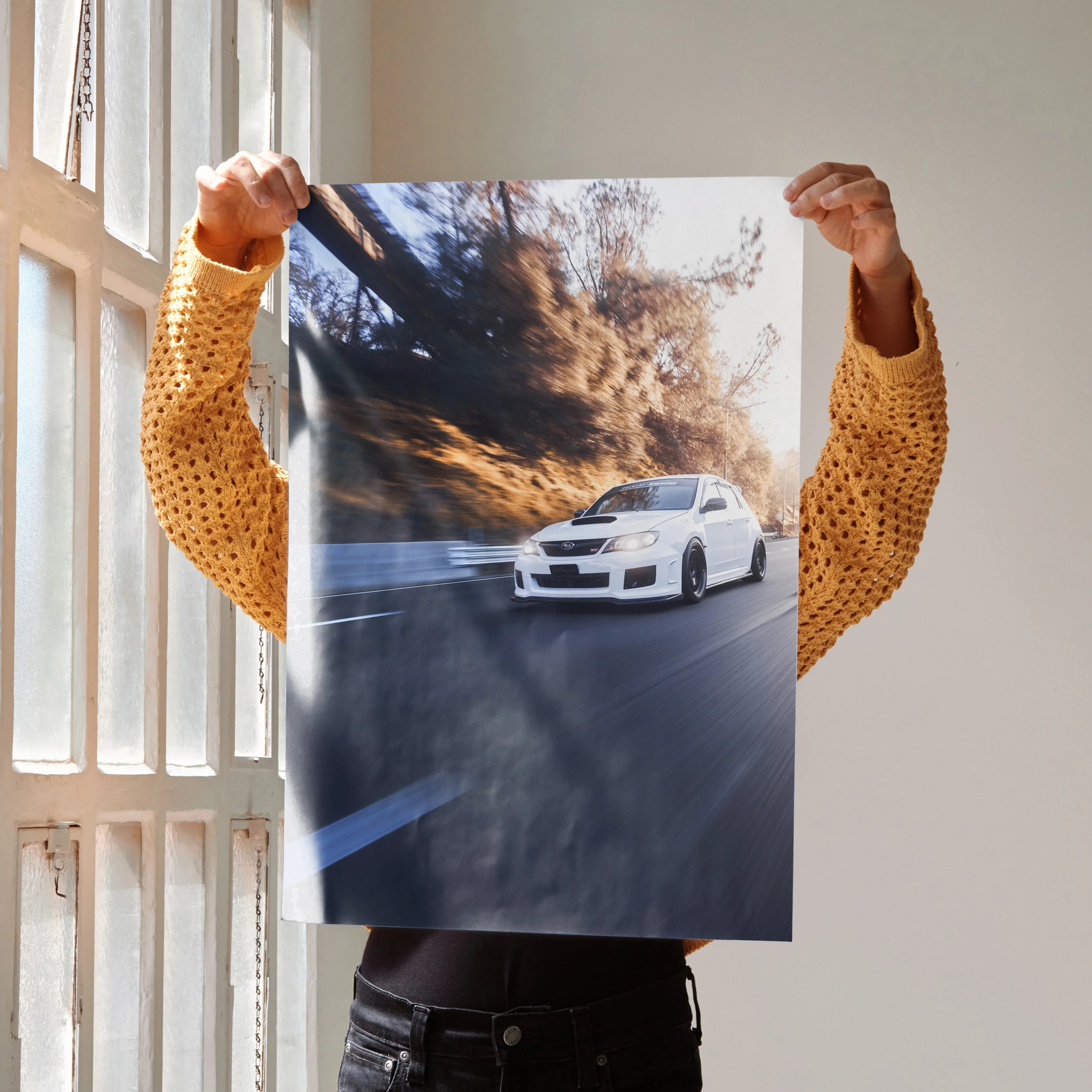 Subaru WRX STI racing on winding road poster wall art with dynamic motion blur.