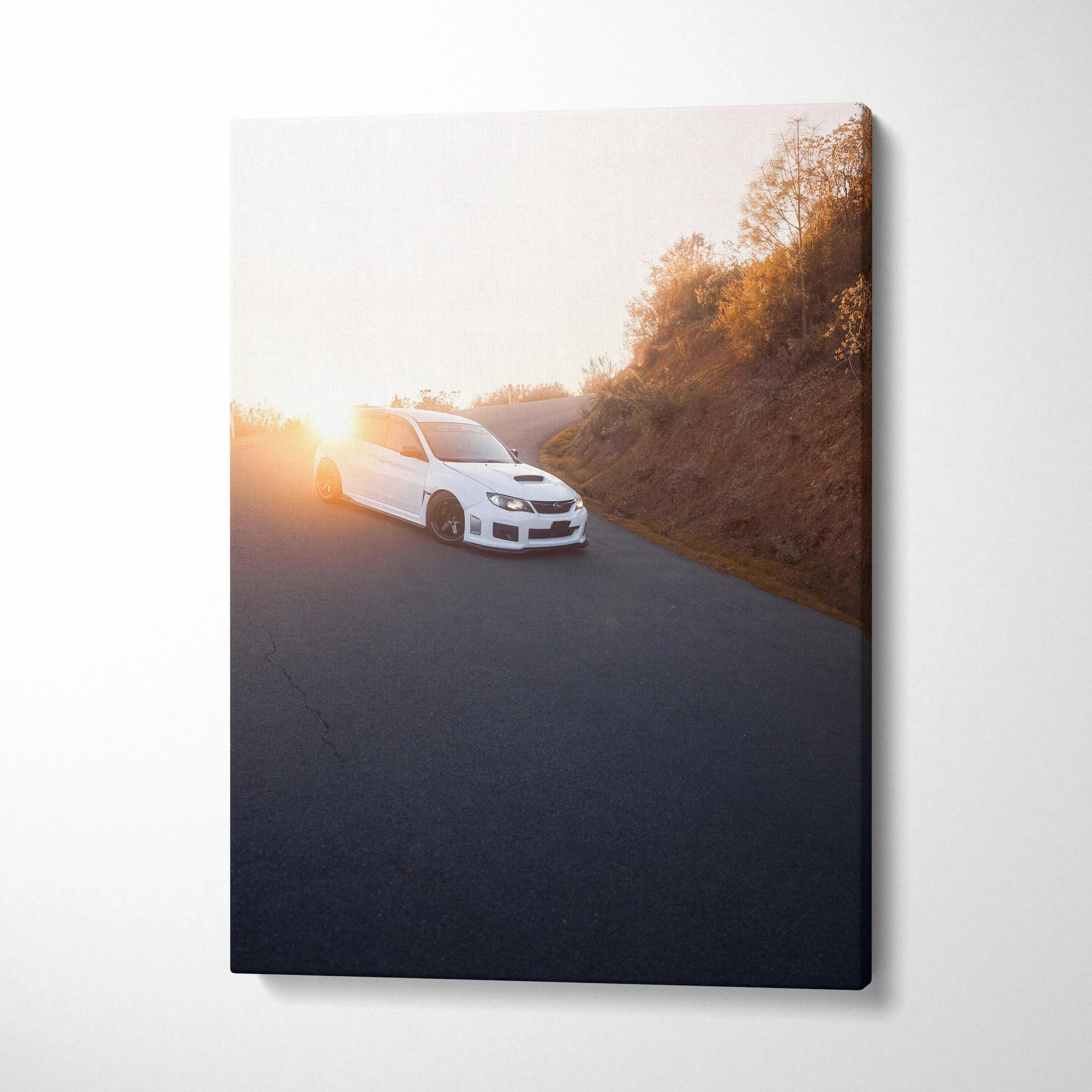 Subaru WRX STI driving on road at sunset wall art vertical canvas print.