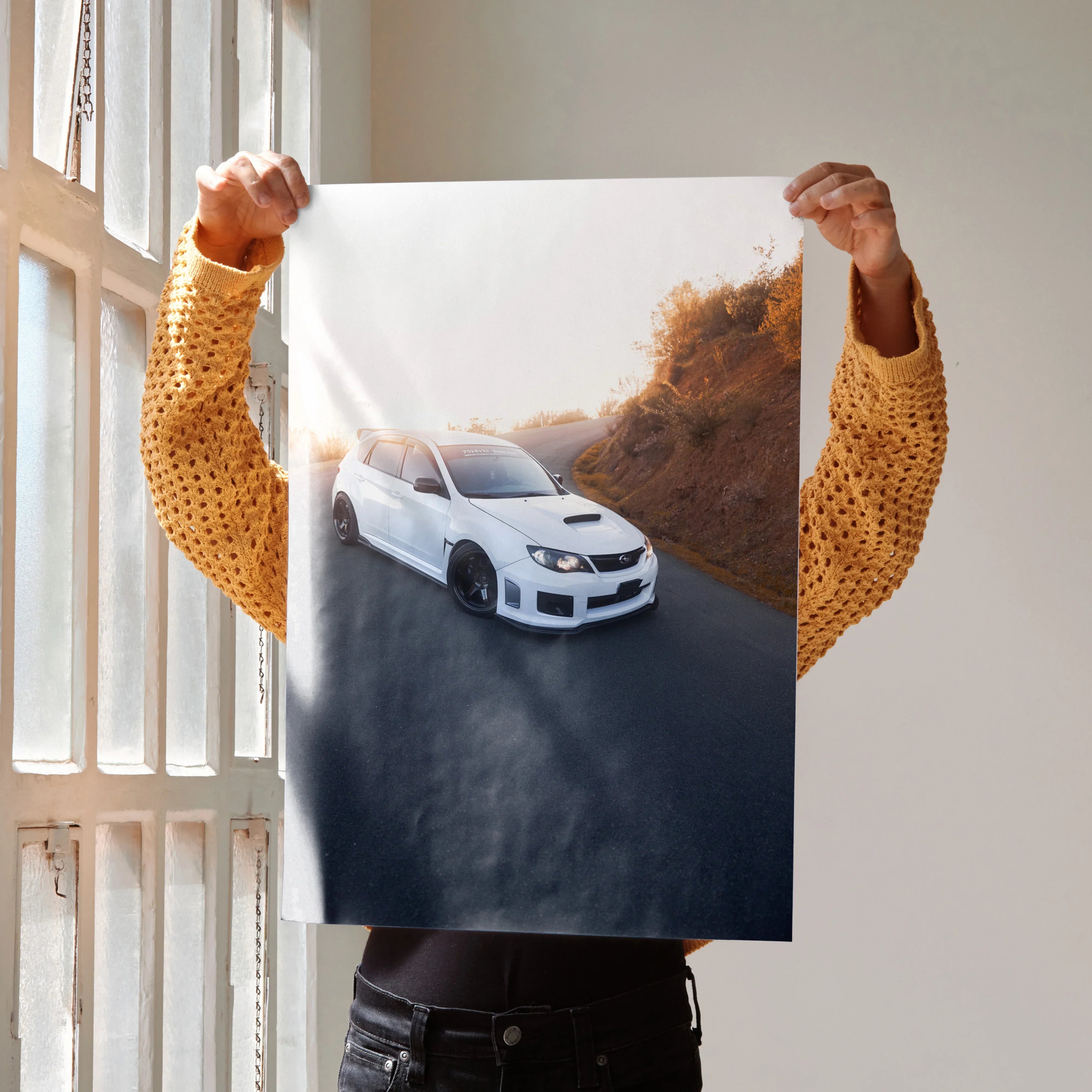 Subaru WRX STI driving on winding road automotive passion poster wall art in hand.