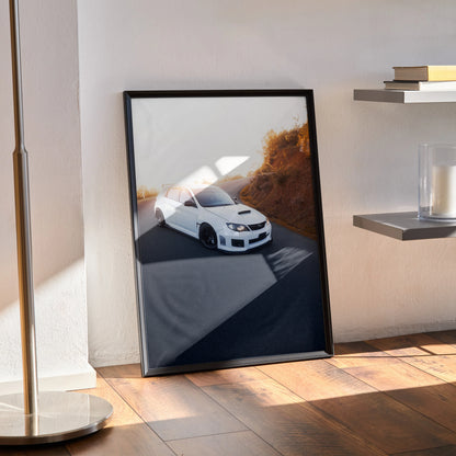 Subaru WRX STI poster featuring white car on mountain road, high-quality wall art in black frame.