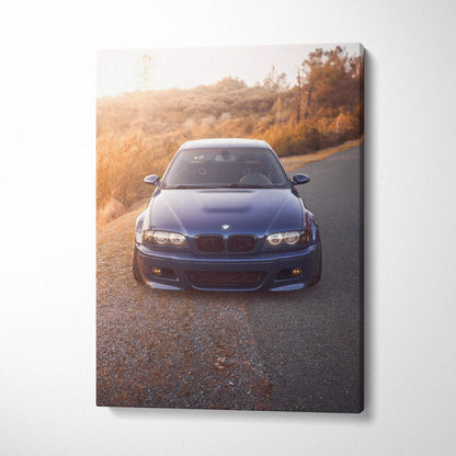 BMW E46 M3 car on sunlit road canvas wall art with warm tones, vertical canvas art print.