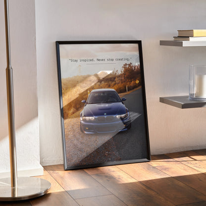 BMW E46 M3 poster wall art with inspiring text and sunset road background in black frame.