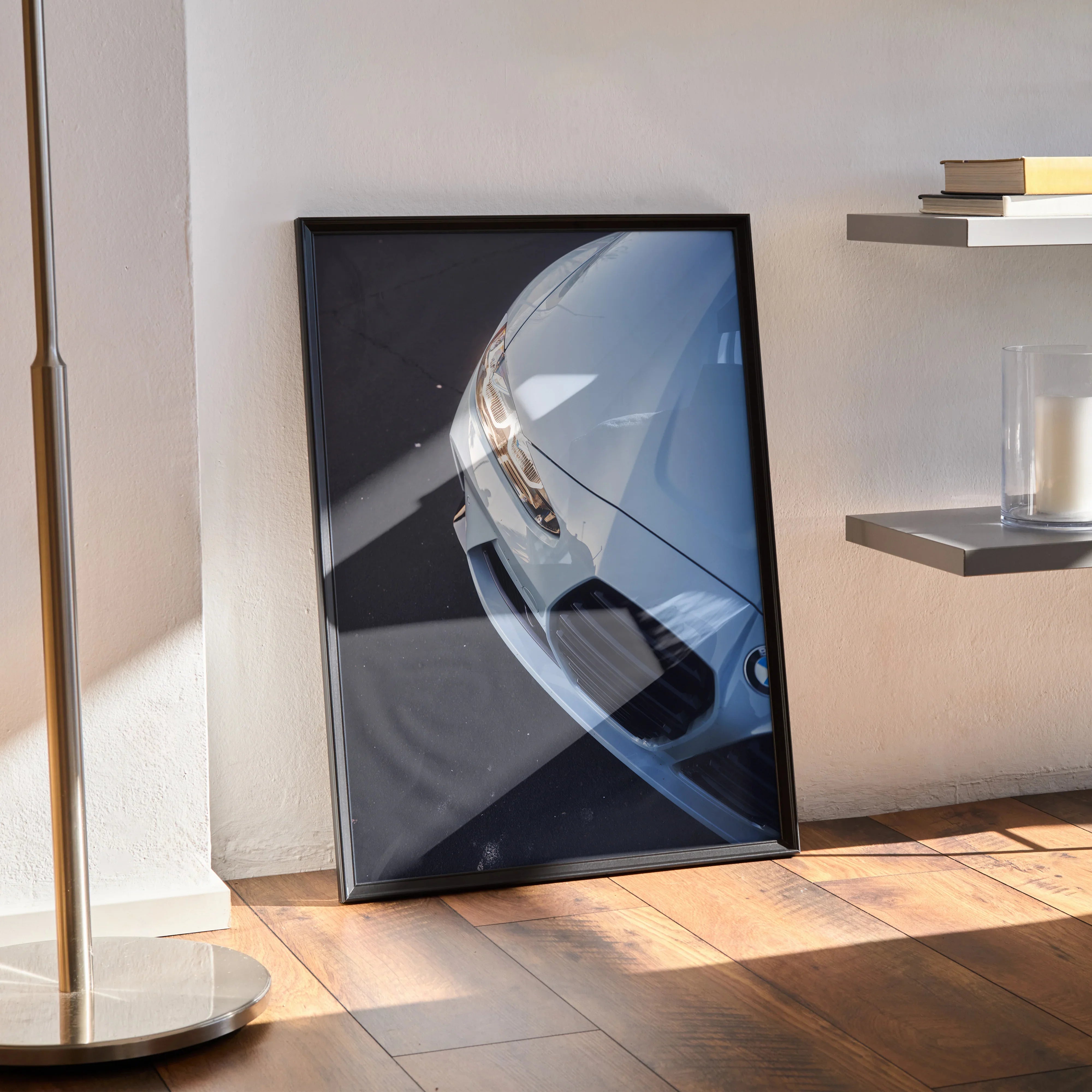 BMW G80 M3 close-up high resolution poster leaning on floor, modern wall art with sleek car detail.