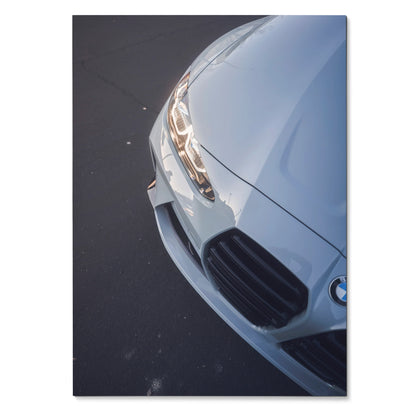 Close-up BMW G80 M3 front grille and headlight high-resolution poster wall art in silver tone.