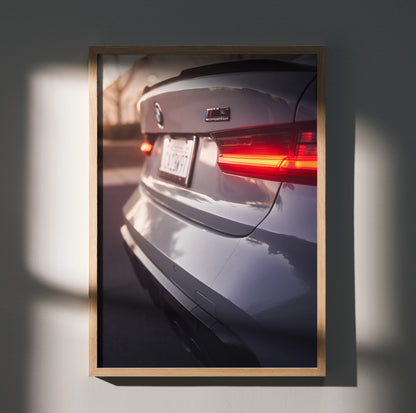 BMW G80 M3 rear close-up wall art poster with illuminated tail light and license plate.