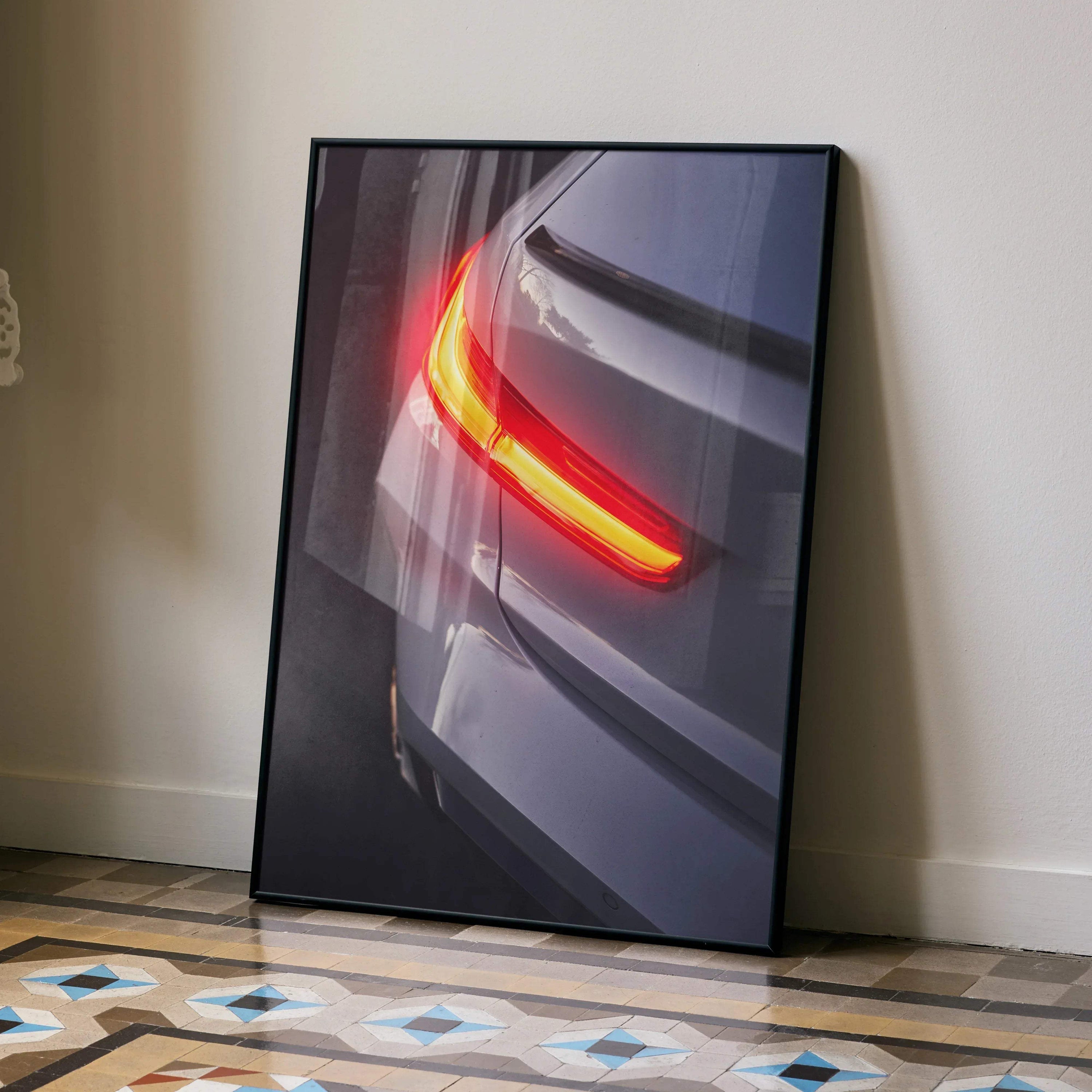 BMW G80 M3 rear close-up poster with glowing red taillight, modern wall art in black frame.
