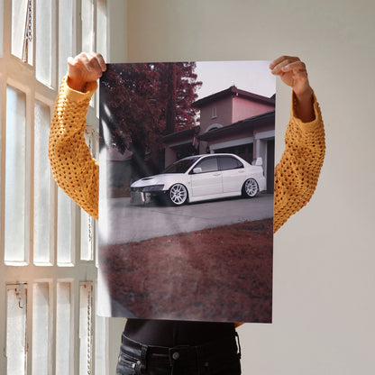 Poster wall art featuring a white Mitsubishi Evo 8 parked in front of a house with autumn trees.