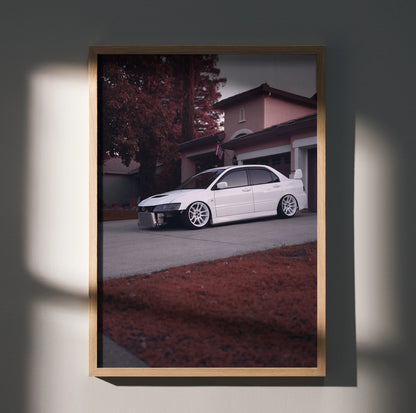 Mitsubishi Evo 8 poster with white car parked by suburban house, modern wall art with autumn tones.