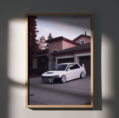 Mitsubishi Evo 8 front view poster wall art with white car in driveway against suburban house background.