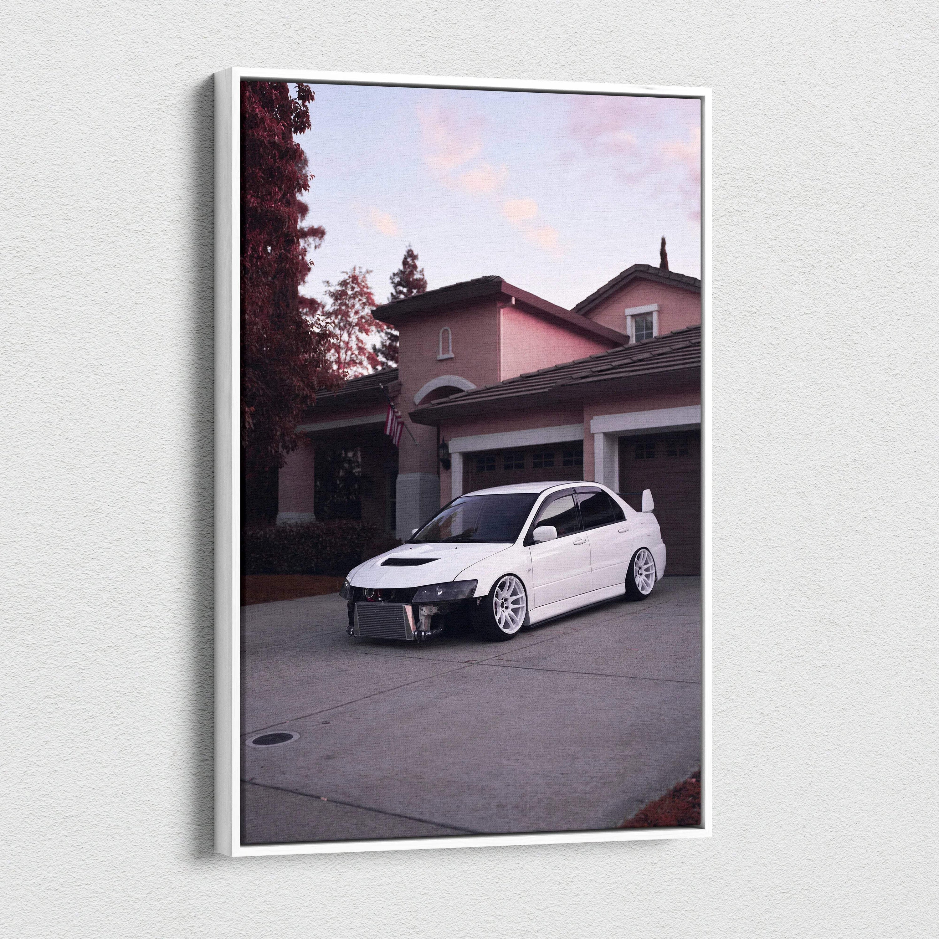 Vertical canvas art featuring a white Mitsubishi Evo 8 parked in a driveway at sunset wall art.