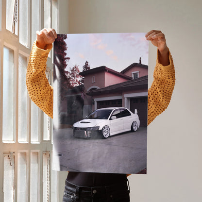 Mitsubishi Evo 8 poster wall art featuring white car in driveway against house backdrop.