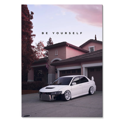Motivational poster wall art featuring a white Mitsubishi Evo 8 parked in front of a suburban house at dusk.
