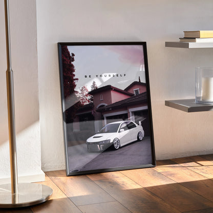 Mitsubishi Evo 8 white car parked in front of house with "Be Yourself" text poster wall art in black frame.