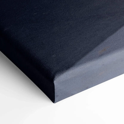Close-up of stretched canvas corner in dark blue for wall art print with museum-quality texture.