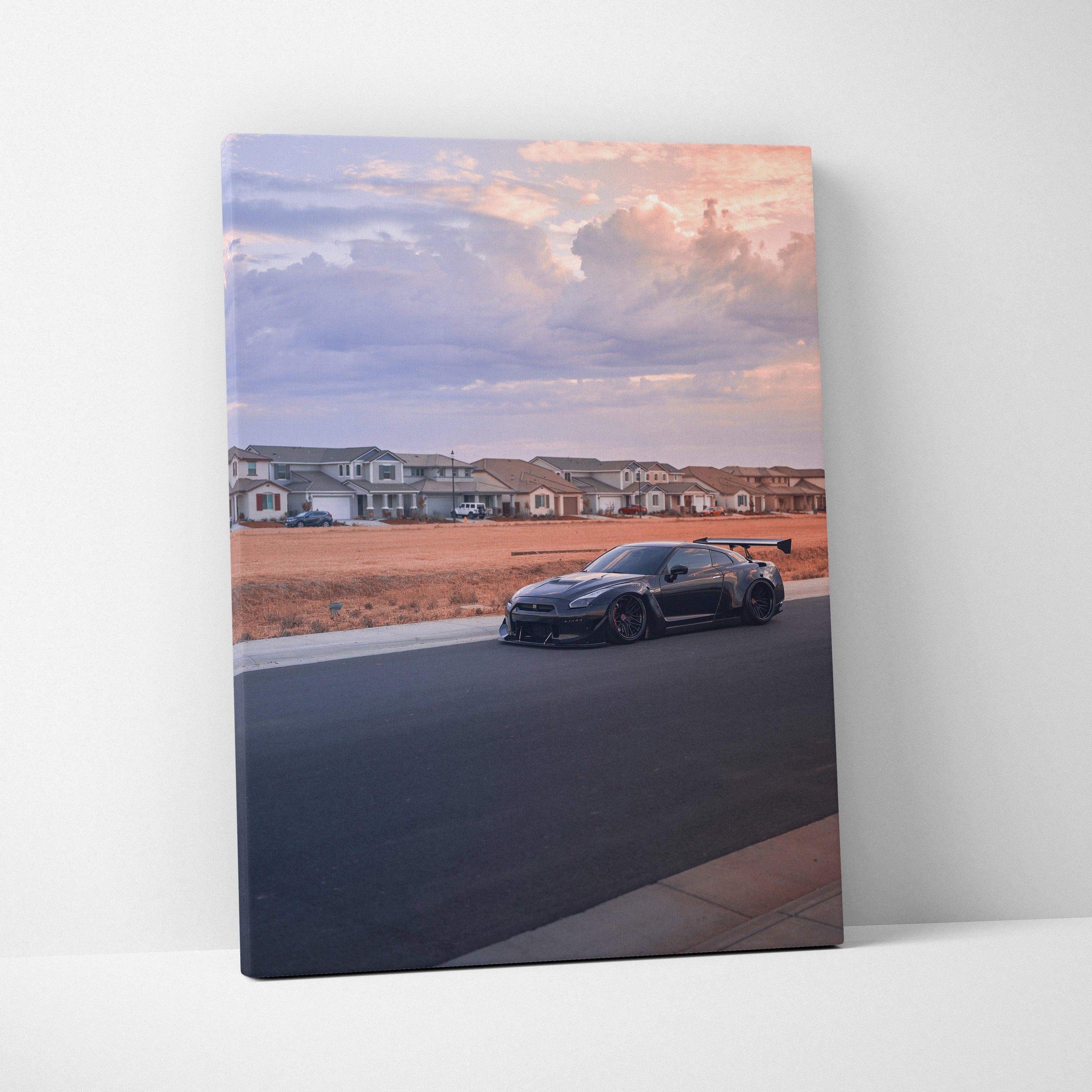 Nissan R35 GTR parked on road at sunset with houses in background vertical canvas wall art.