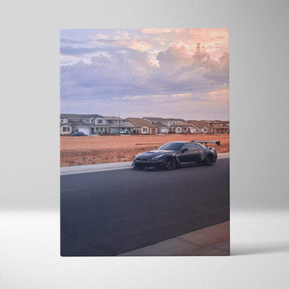 Nissan R35 GTR parked on road with sunset sky in background vertical canvas wall art.