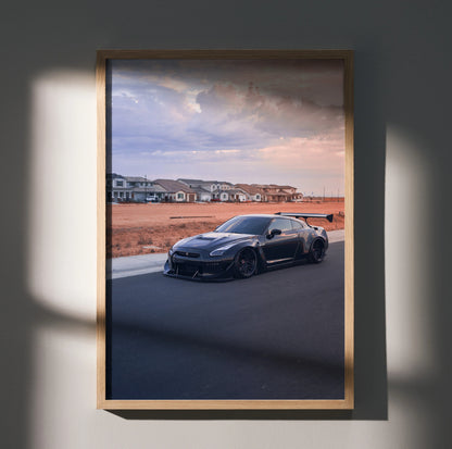 Nissan R35 GTR widebody poster wall art with sunset background in urban setting.