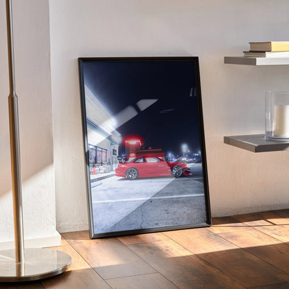 Nissan 240sx S14 Kouki red car at night city scene poster wall art in black frame.