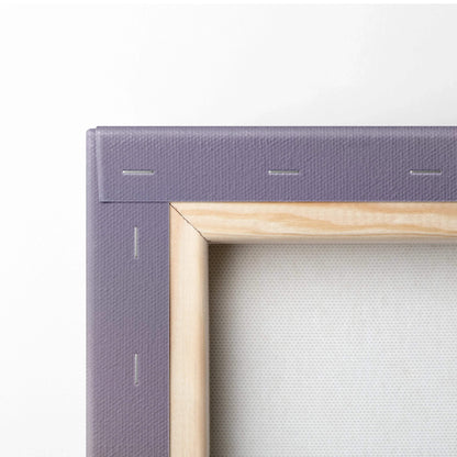 Close-up of wooden stretcher bar and purple canvas backing with staple details for vertical wall art canvas print.
