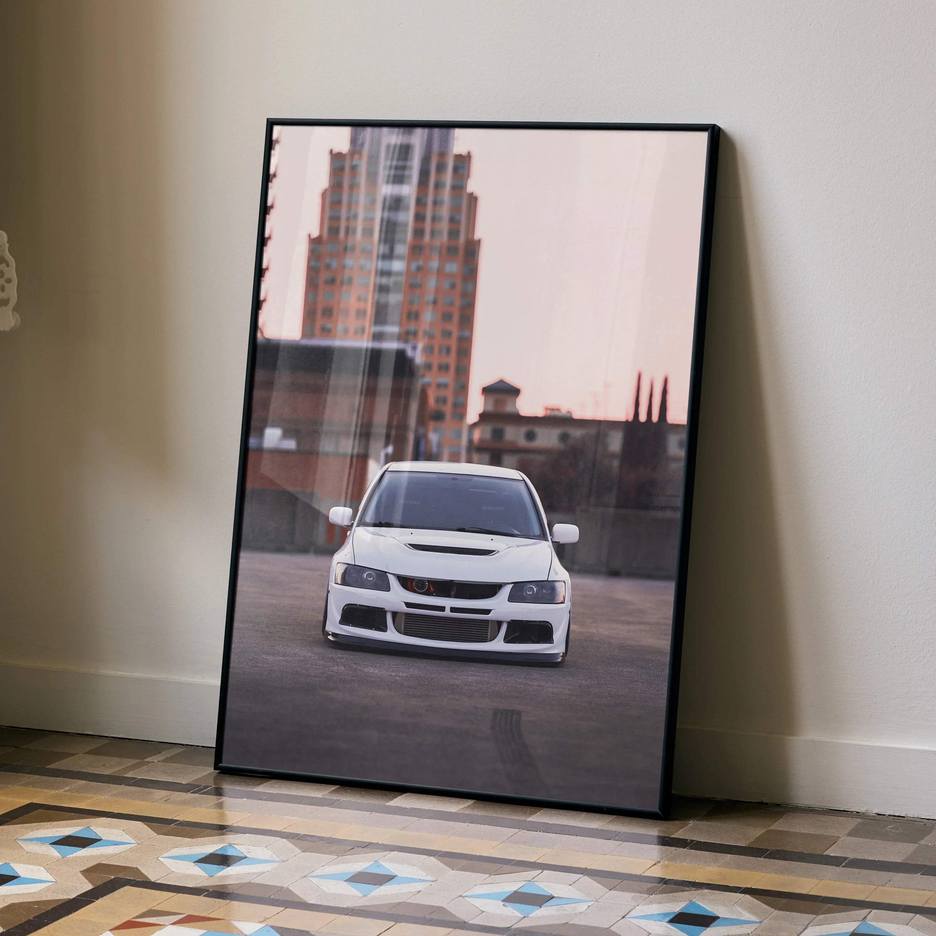 Mitsubishi Evo 8 white rally car poster leaning against wall on patterned floor wall art.