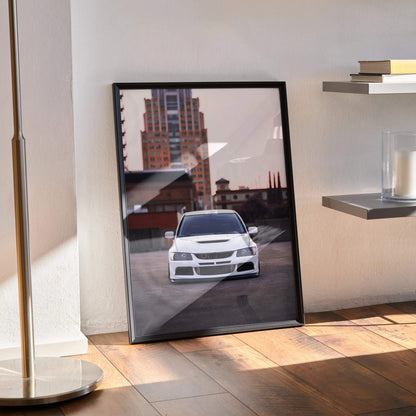 Mitsubishi Evo 8 white car poster with urban city backdrop framed wall art on wood floor.