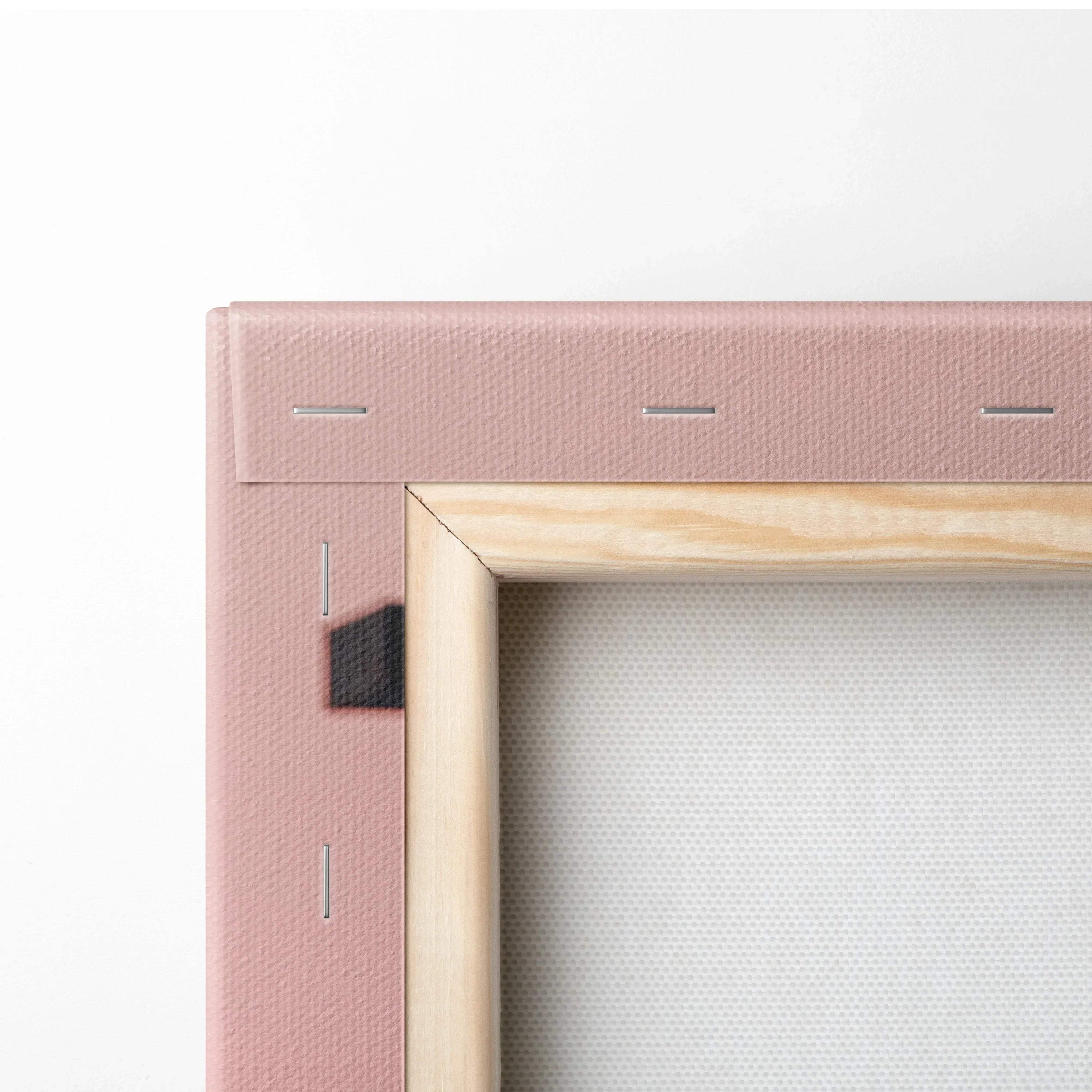 Close-up of wooden frame corner and stretched canvas backing for vertical wall art canvas print.