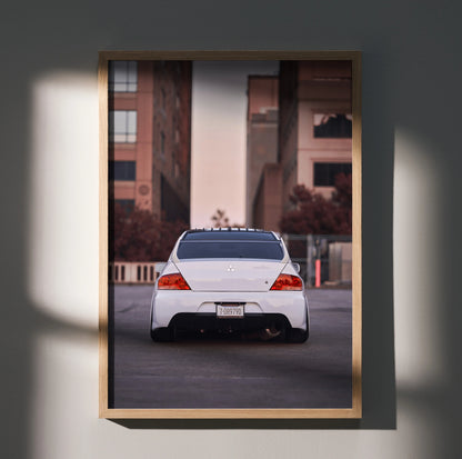 Mitsubishi Evo 8 rear view poster in urban setting, premium automotive wall art.