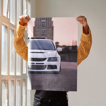 White Mitsubishi Evo 8 front view poster with urban background, high-resolution wall art.