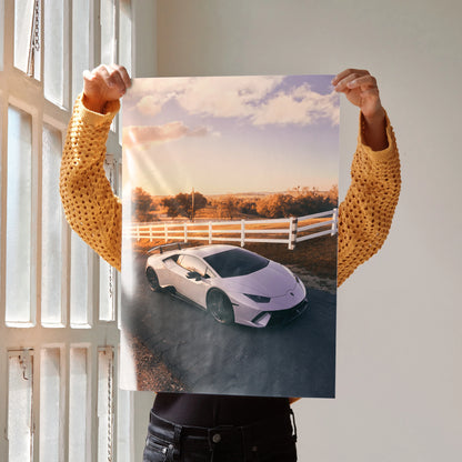 Lamborghini Huracan poster showcasing white sports car on rural road at sunset wall art.