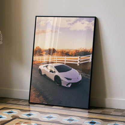 Lamborghini Huracan poster wall art with white sports car on road and scenic countryside background.