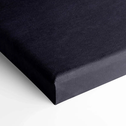 Black stretched canvas corner with textured fabric surface for wall art or canvas art print.