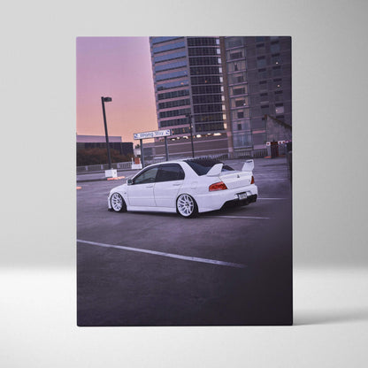 Vertical canvas wall art featuring a white Mitsubishi Evo 8 parked in an urban rooftop setting at sunset.