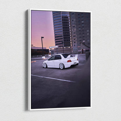 Vertical canvas art featuring a white Mitsubishi Evo 8 parked in an urban rooftop setting at sunset, wall art for car.