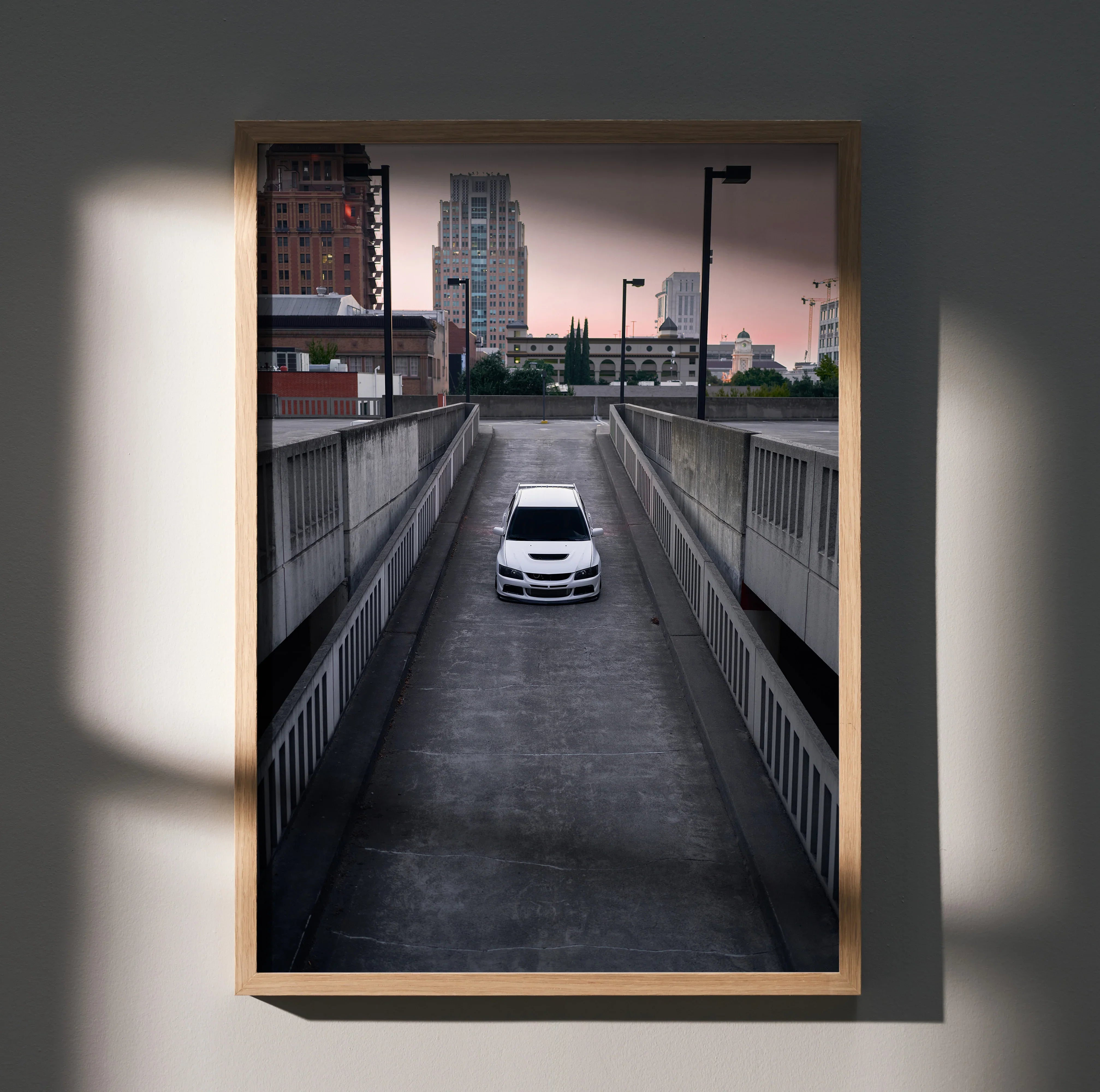 Mitsubishi Evo 8 poster wall art featuring white car in urban tunnel at dusk.