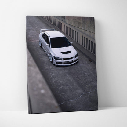 Vertical canvas art featuring a white Mitsubishi Evo 8 on a concrete road, modern wall art print.