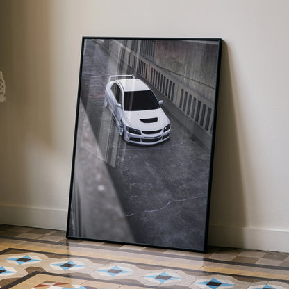 Mitsubishi Evo 8 poster wall art showing a white Evo 8 car on an urban street at dusk.