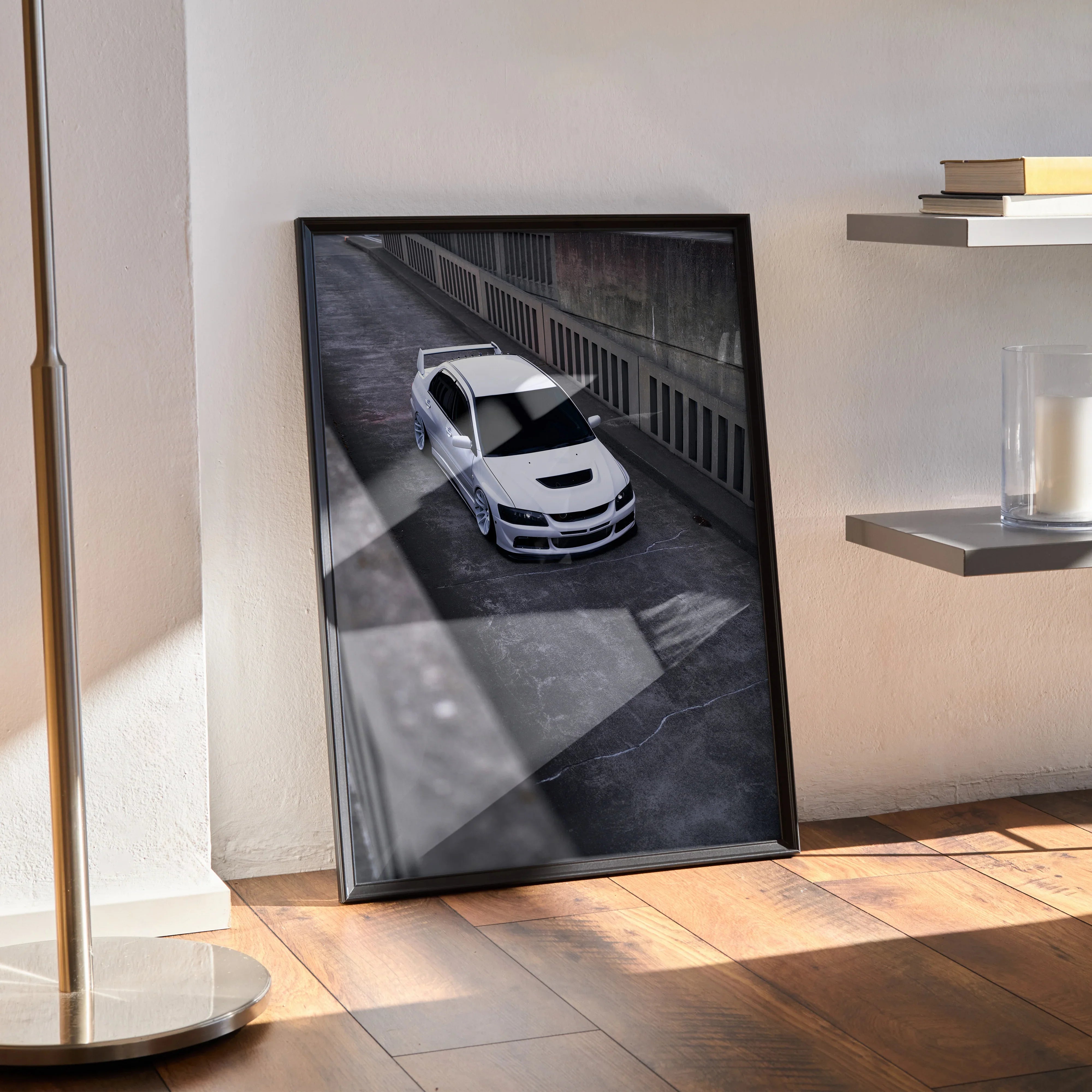 Mitsubishi Evo 8 poster wall art featuring a high-resolution top-down view of a white car on a dark urban street, framed and .
