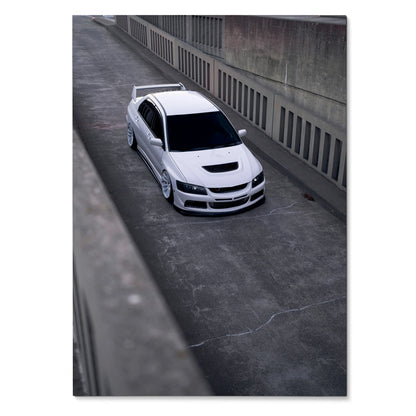 White Mitsubishi Evo 8 parked on concrete street poster wall art.