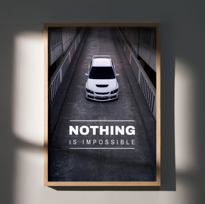 Motivational wall art poster featuring a white Mitsubishi Evo 8 from above with "Nothing is impossible" text.