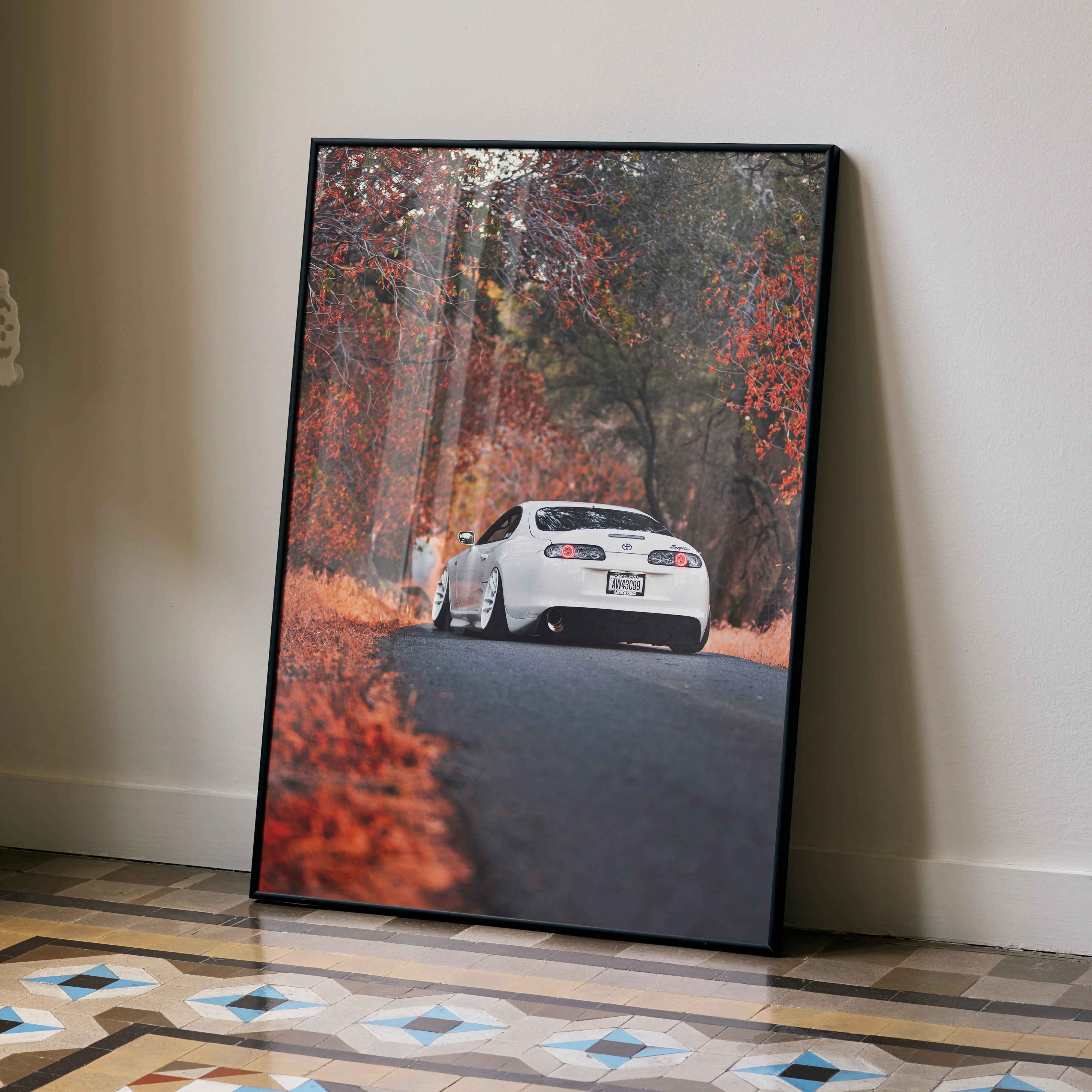 Toyota Supra MK4 poster featuring rear view of white car on autumn road, automotive wall art.