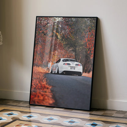 Toyota Supra MK4 poster featuring rear view of white car on autumn road, automotive wall art.